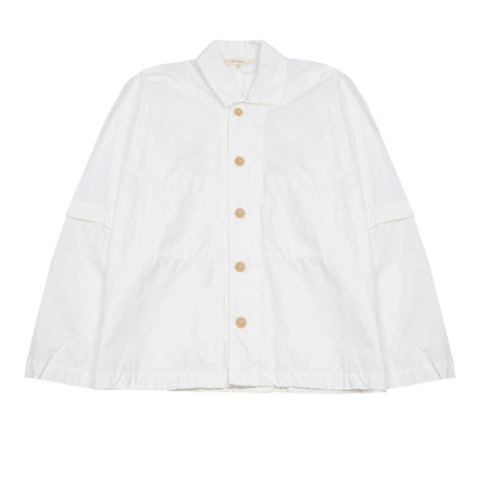 The Long Sleeve Camp Collar Shirt in Chalk is a relaxed camp collar shirt featuring a utility front patch pocket, internal pocket on the left side, front button opening, and a single back vent. This shirt has a unique construction without an armhole or shoulder seam, prioritising comfort and and allowing for versatile sizing. 98% Cotton, 2% Elastane. Made in England.