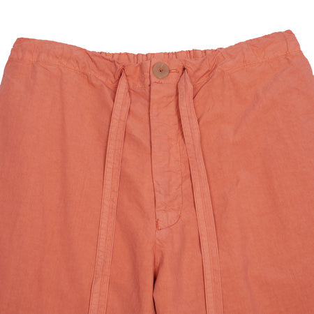 The Orihon Trouser in Burnt Sienna is a wonderfully relaxed spring/summer weight trouser, constructed with a roomy wide leg and comfortable half-elasticated waistband with drawstring. Made from a lightweight paper cotton fabric with inseam side pockets and two patch flap rear pockets. 80% Cotton, 18% Tencel, 2% Elastane. Made in England. Size 1 is equivalent to a UK women's 10 and a men's Small.