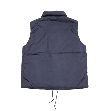 Loft Technical Nylon Vest in Navy is a padded layering piece for extra warmth. Featuring off-centre button closure to keep the cold out, front slash pockets, and a miniature shawl neckline that can be turned up against the elements. The waist has an adjustable drawstring for fit and to keep cosy.  100% nylon. Filling: 100% Polyamide Primaloft insulation.